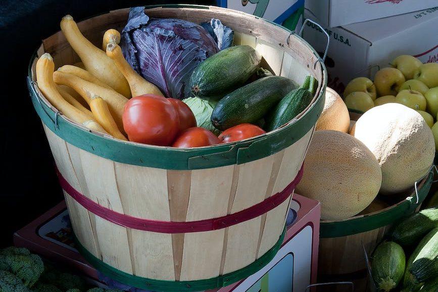 pile of assorted varieties of fruits and vegetables, for Lughnasadh, first harvest, abundance festivals, to celebrate harvest and honor seasonal traditions