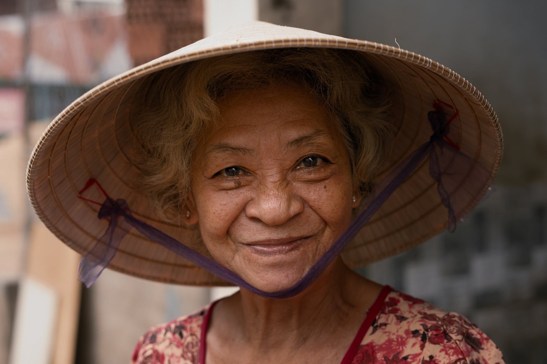woman wearing brown wicker hat