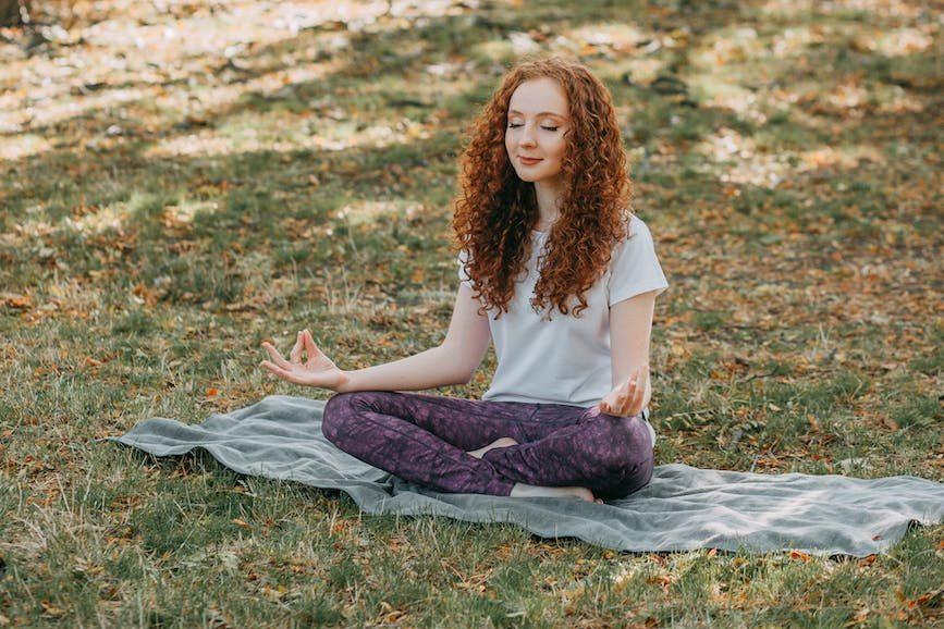 photo of woman meditating