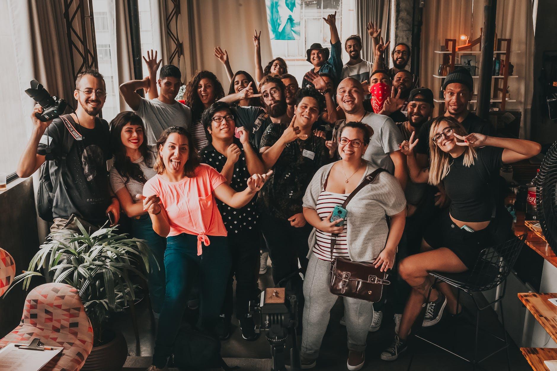 positive diverse people making faces at camera for Lughnasadh, first harvest, abundance festivals, to celebrate harvest and honor seasonal traditions