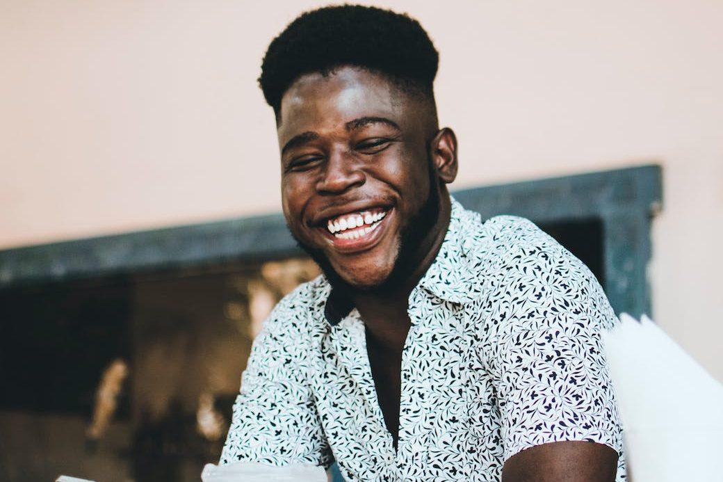 man wearing white button up shirt