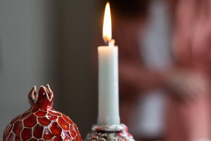 pattern table candles candle, evoking: Persephone, Greek goddess, transformation, Scorpio season, and Autumn themes