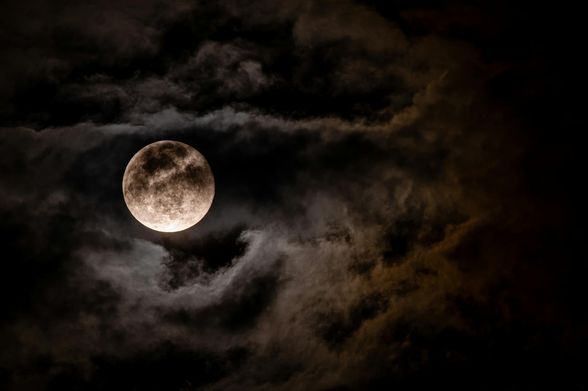 photo of a full moon, illustrating lunar cycle, moon rituals, moon phases meaning, lunar wisdom, and working with the moon
