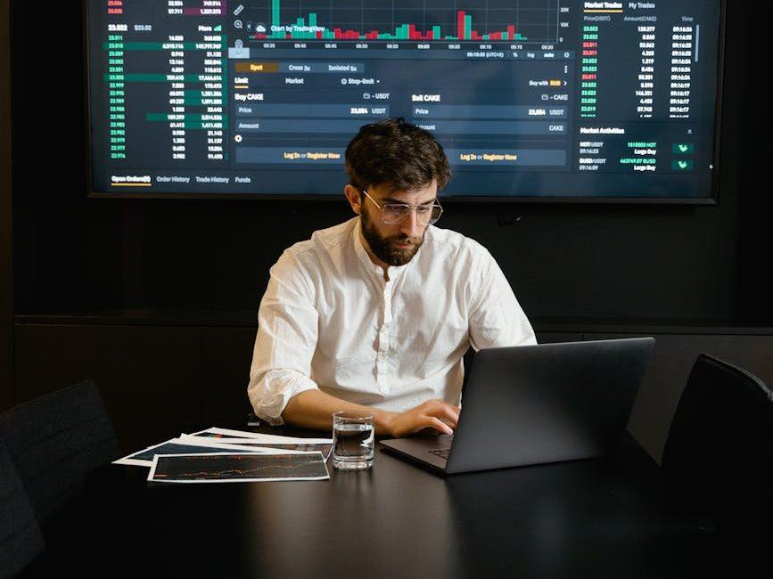 focused professional man using laptop