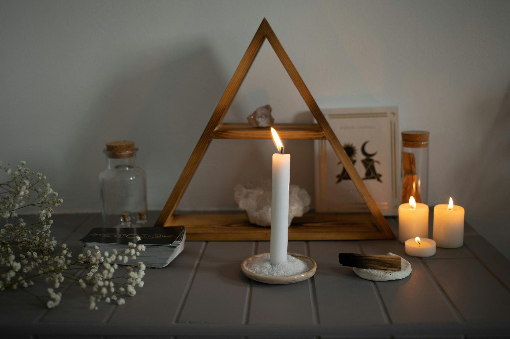 Candles on altar, evoking: The Witches' New Year, Celebrate Samhain, Cycles of Renewal, ancestor veneration, and Pagan traditions