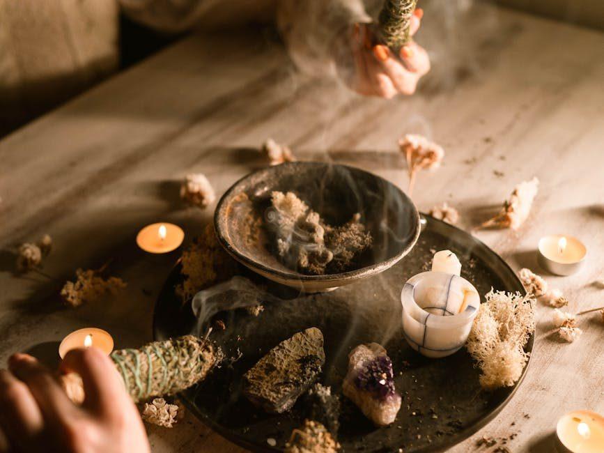 smoke coming from the burning white sages, evoking: sacred incense, incense for Samhain, ritual incense blend, herbal incense recipe, and ancestor offering incense