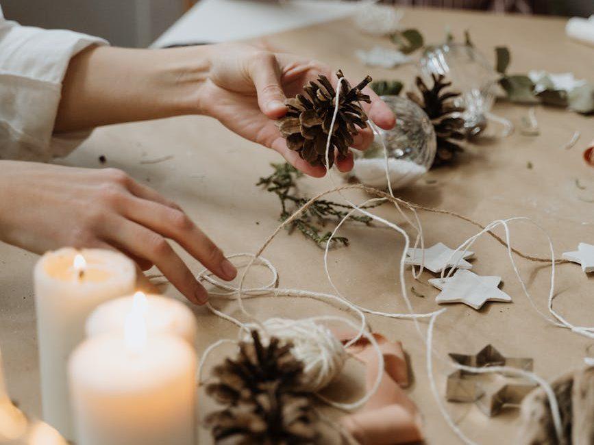 close up of women doing christmas arts and crafts