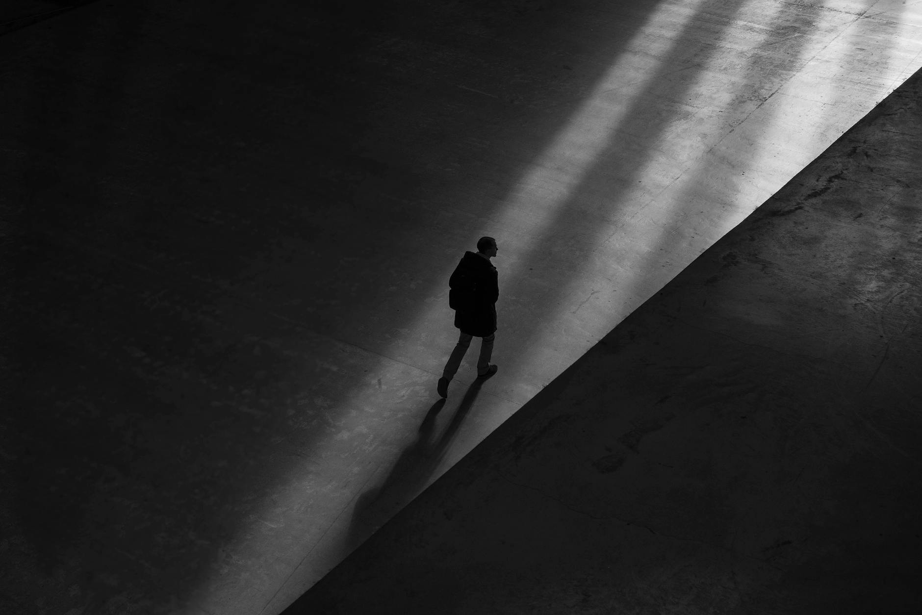 man walking on floor, evoking: Sagittarius, Sagittarius season, Hellenistic astrology, Zodiac, and wisdom