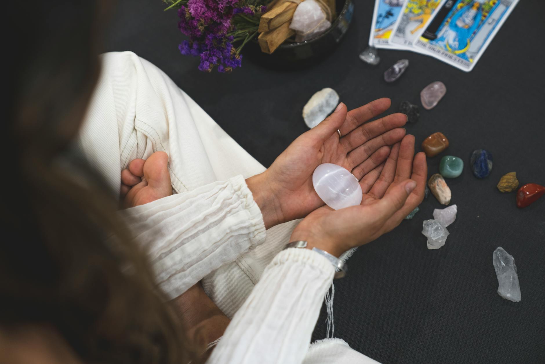 person holding a stone