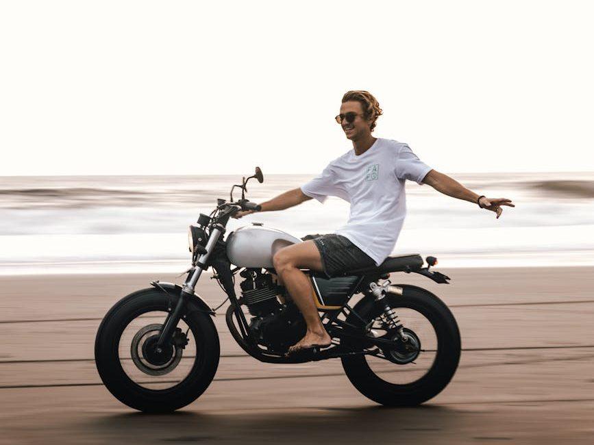 photo of man riding bicycle