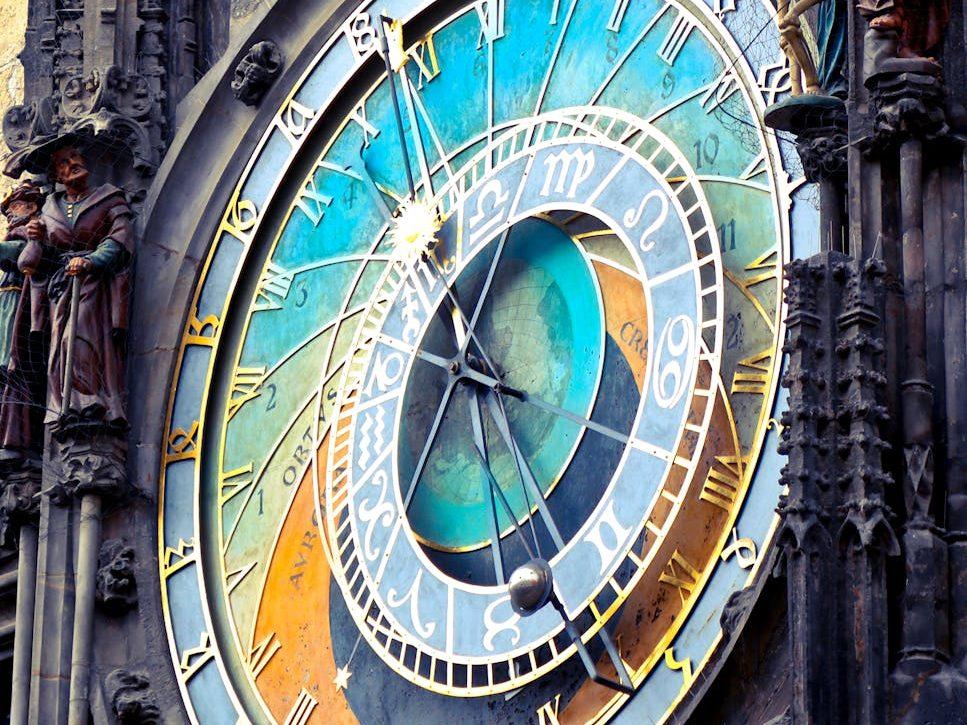 astronomical clock in prague, evoking: Capricorn, winter solstice, zodiac, astrological sign, and the solar cycle