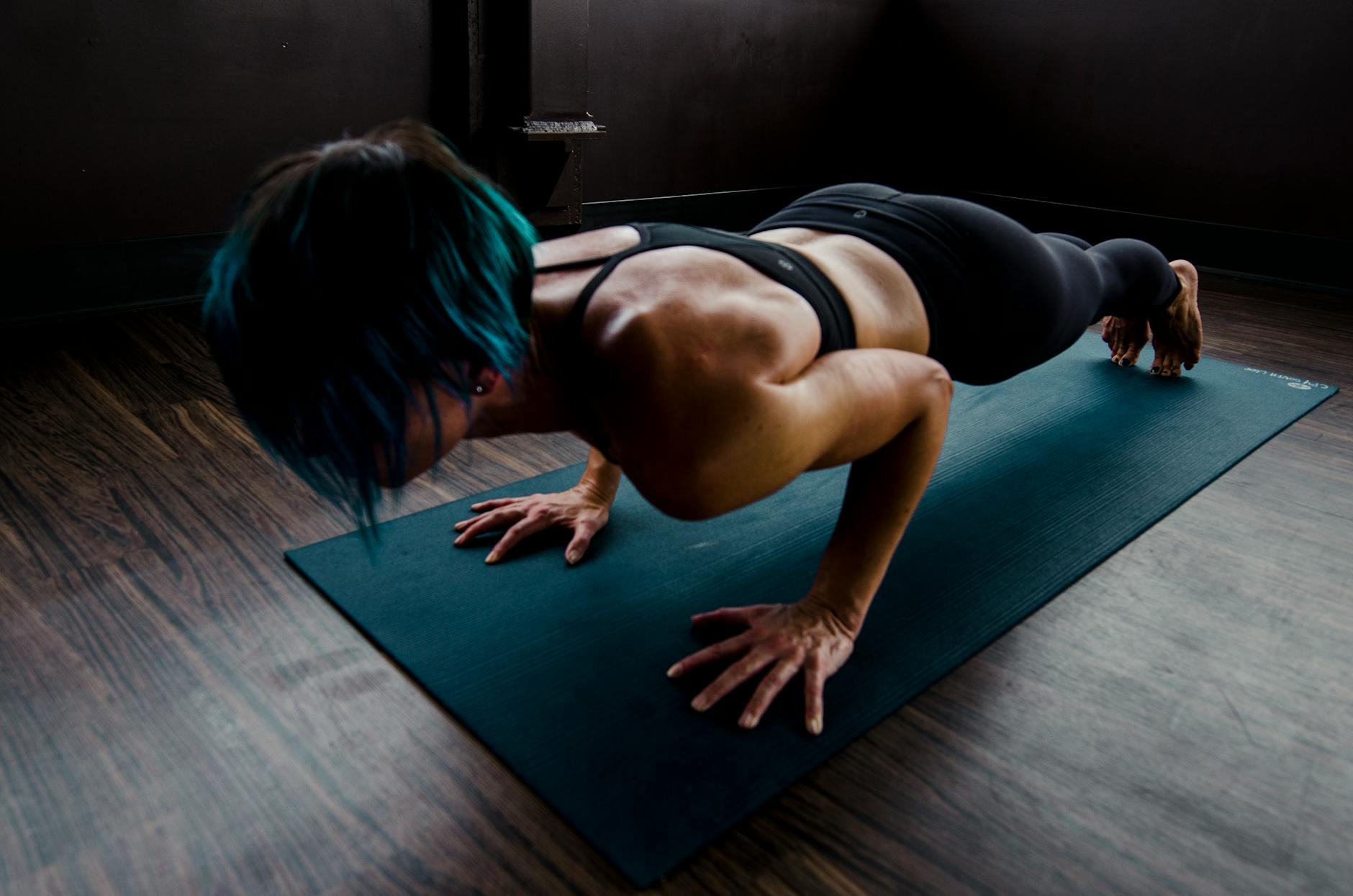 woman doing yoga, exploring types of meditation and meditation techniques, as well as the benefits of meditation, mindfulness meditation, and how to meditate