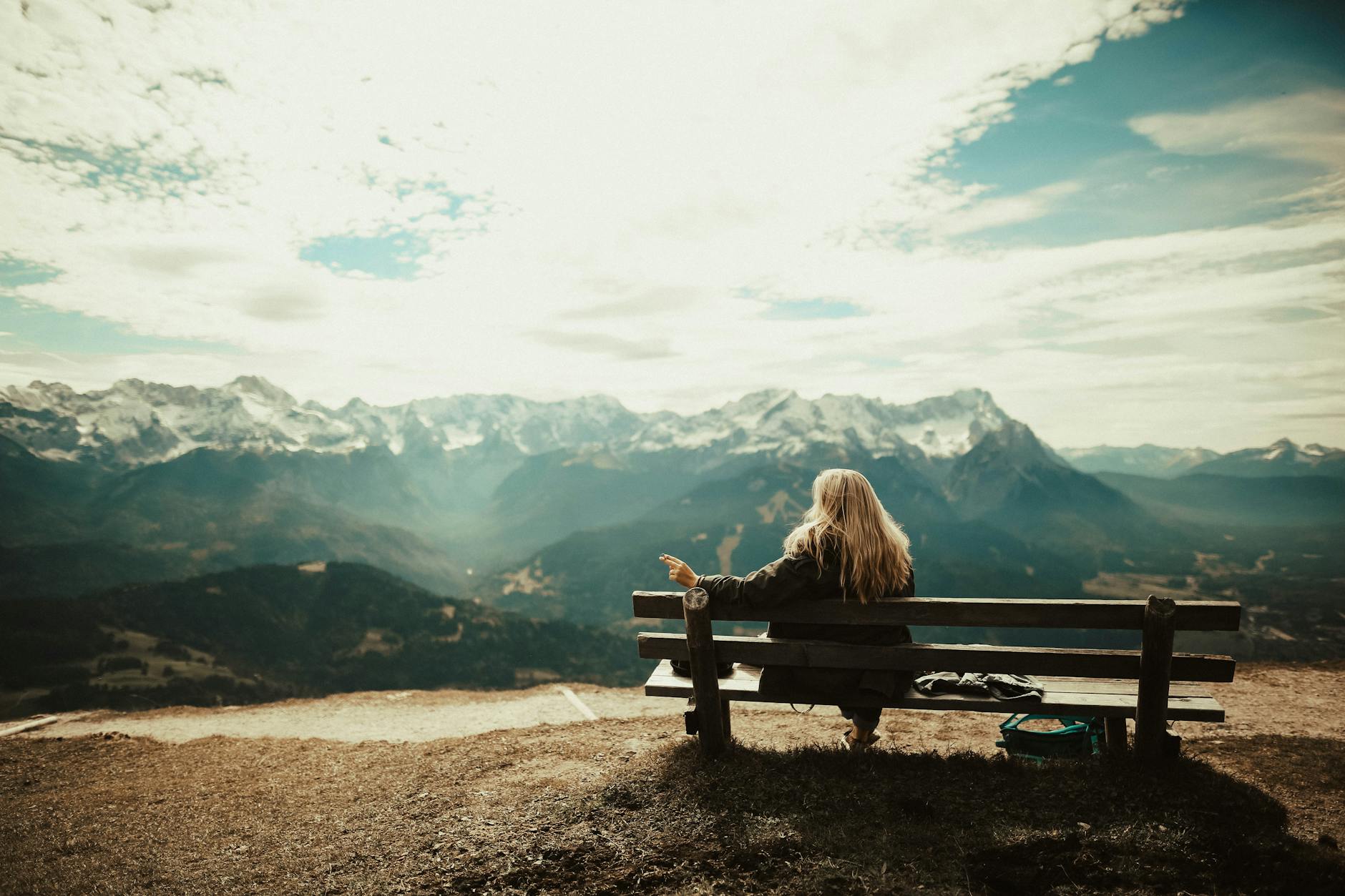 woman sitting on bench, evoking advanced meditation techniques, deep meditation practice, meditation journey, advanced mindfulness, and spiritual growth meditation