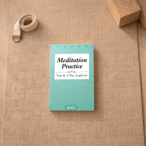 Meditation Practice Logbook on a yoga mat