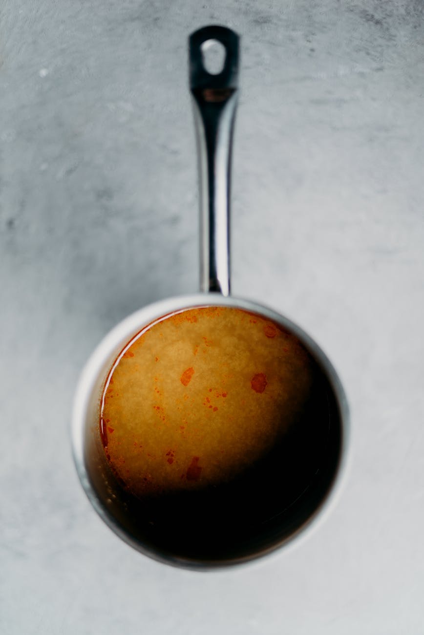 top view photo of pot, showing: ways to celebrate harvest, a stew recipe, a seasonal recipe, an autumn ritual, and celebrate Wheel of the Year