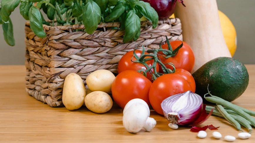 vegetables near the basket, showing: ways to celebrate harvest, a stew recipe, a seasonal recipe, an autumn ritual, and celebrate Wheel of the Year