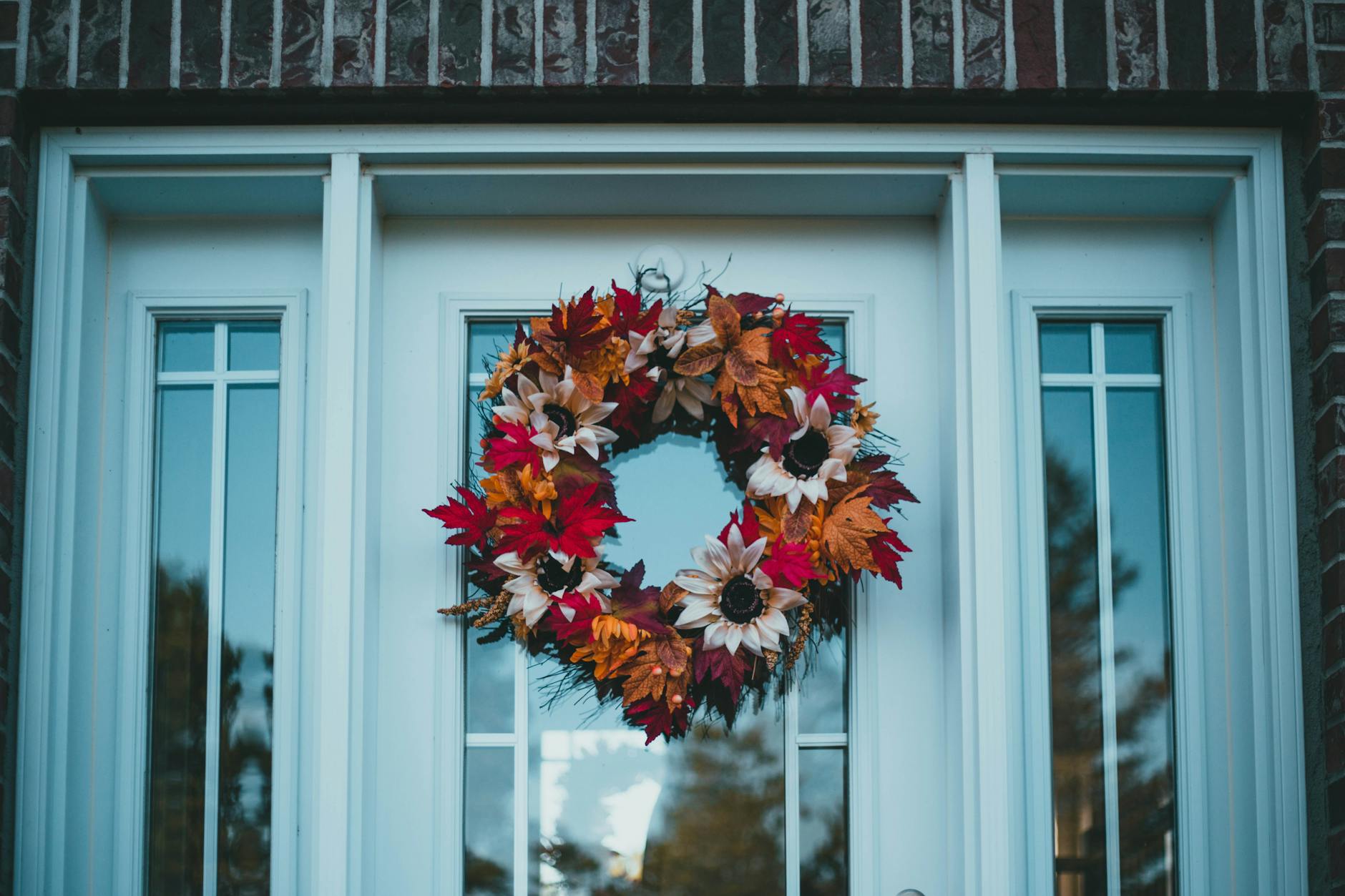 autumn wreath on door, evoking: Mabon wreath, autumn equinox craft, seasonal wreath symbolism, harvest celebration decor, and DIY fall wreath