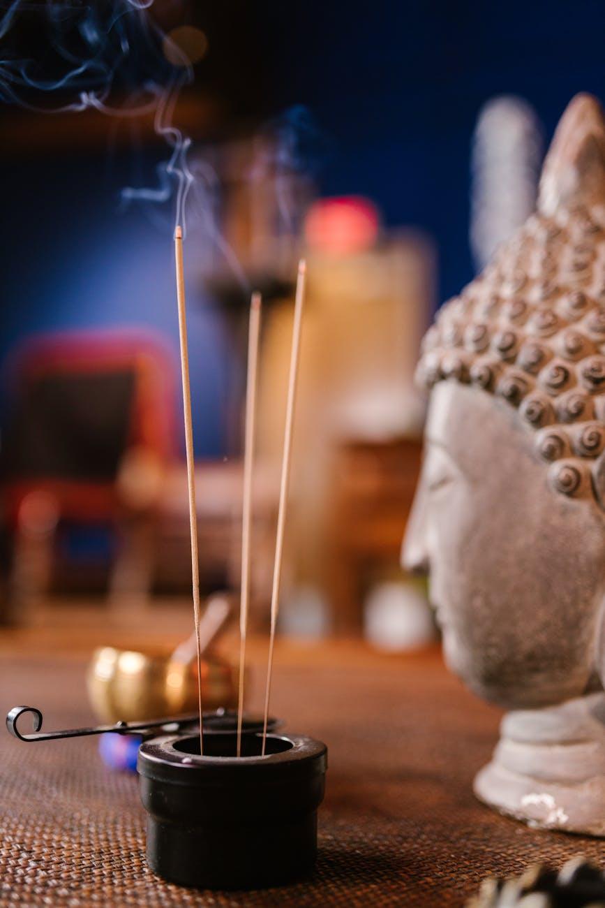 close up of incense sticks, evoking: sacred incense, incense for Samhain, ritual incense blend, herbal incense recipe, and ancestor offering incense