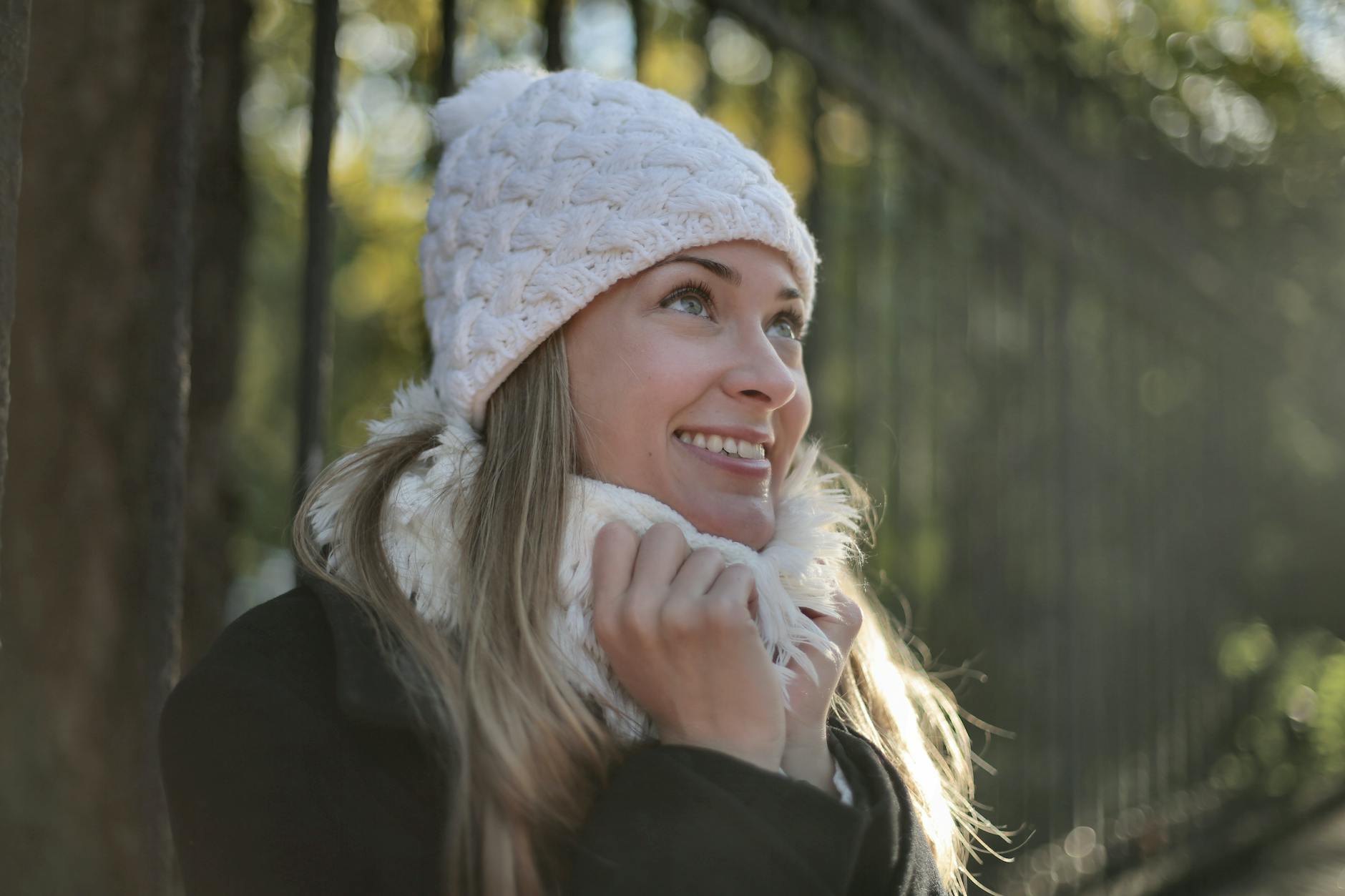 photo of woman wearing white beanie, illustrating: gratitude, heart-brain coherence, abundance mindset, reciprocity, and wellbeing