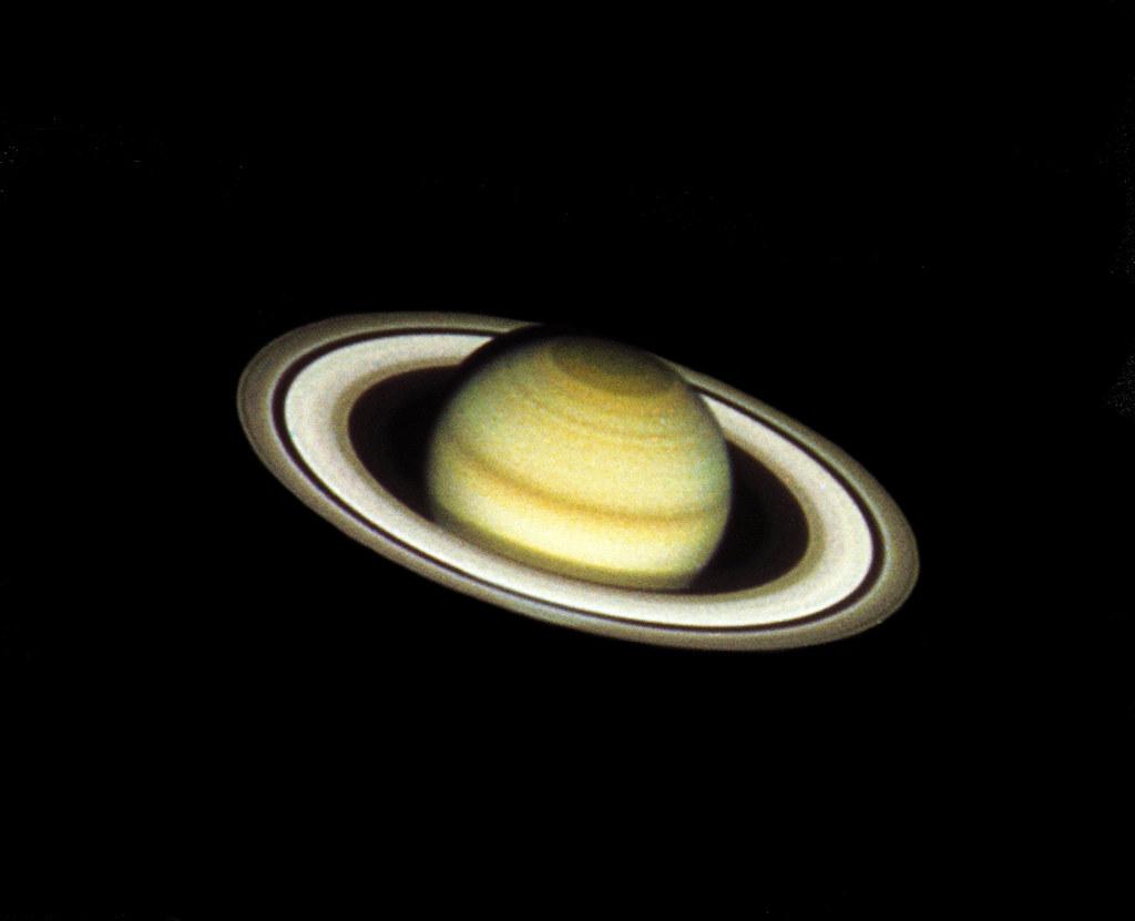 Saturn - taken with the Hubble Space Telescope, evoking: Capricorn, winter solstice, zodiac, astrological sign, and the solar cycle